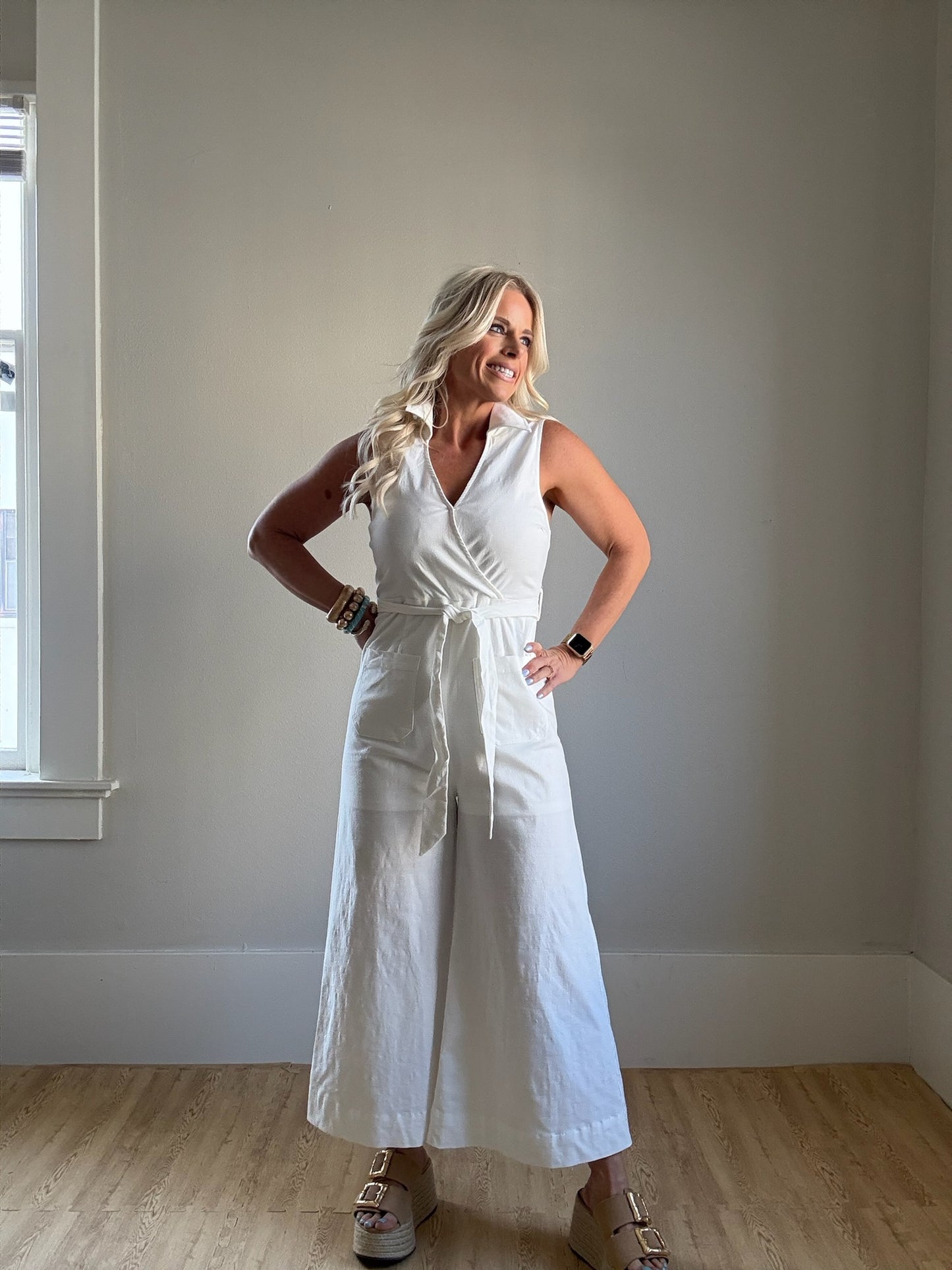 White Sleeveless Faux Wrap Jumpsuit