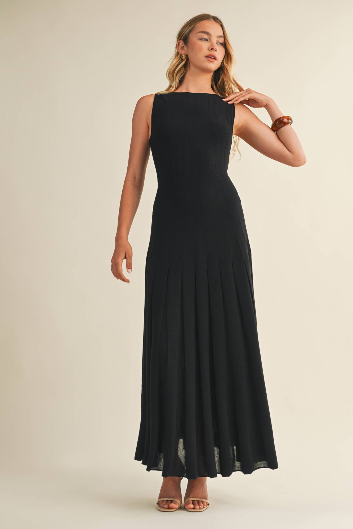 SLEEVELESS FLARE SWEATER DRESS